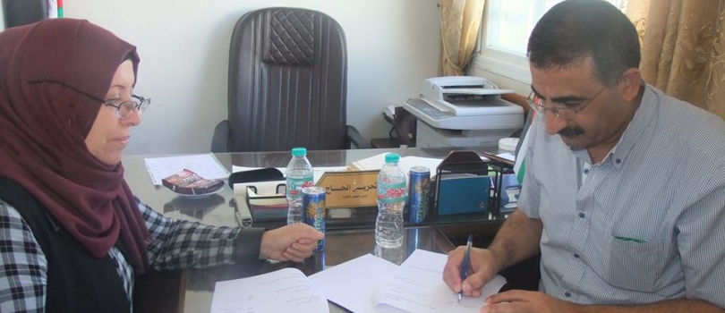 singing MOU with Women Program Centers